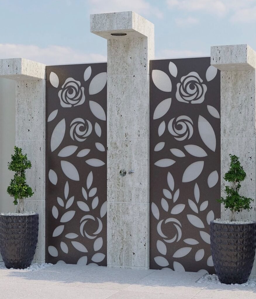Floral-pattern decorative screens between stone-clad pillars, finished with matching planted pots.
